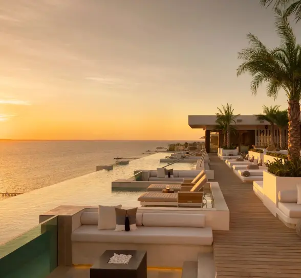 sunset over the pool at Impression Isla Mujeres by Secrets
