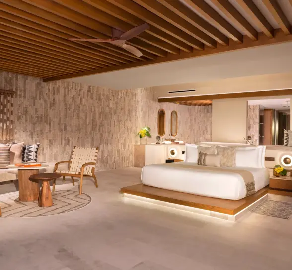bedroom inside a suite at Impression Isla Mujeres by Secrets