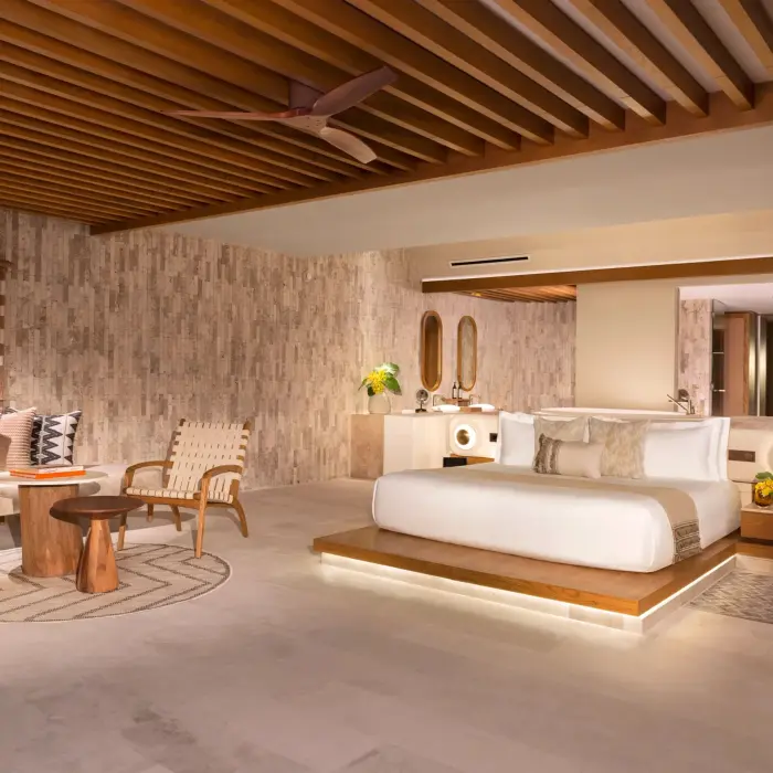 bedroom inside a suite at Impression Isla Mujeres by Secrets
