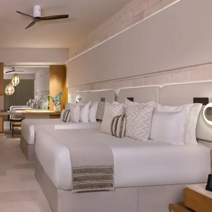 suite with two beds at Impression Isla Mujeres by Secrets
