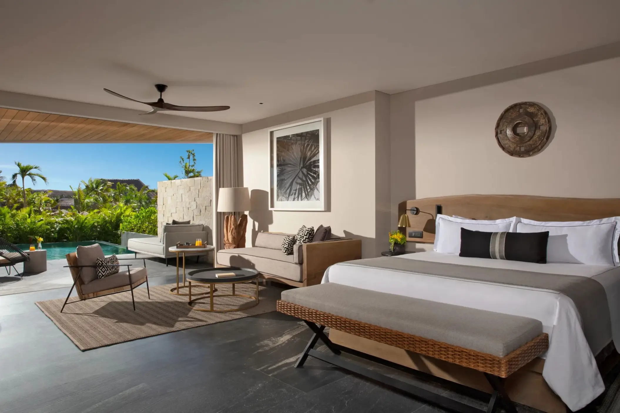 Signature Swim-Out Suite with stylish decor, direct pool access, and garden views at Secrets Impression Moxché.