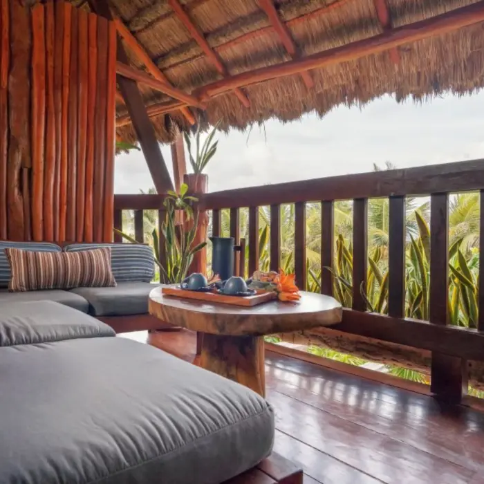 balcony of partial ocean view two double beds suite at Kanan Tulum Hotel & Spa