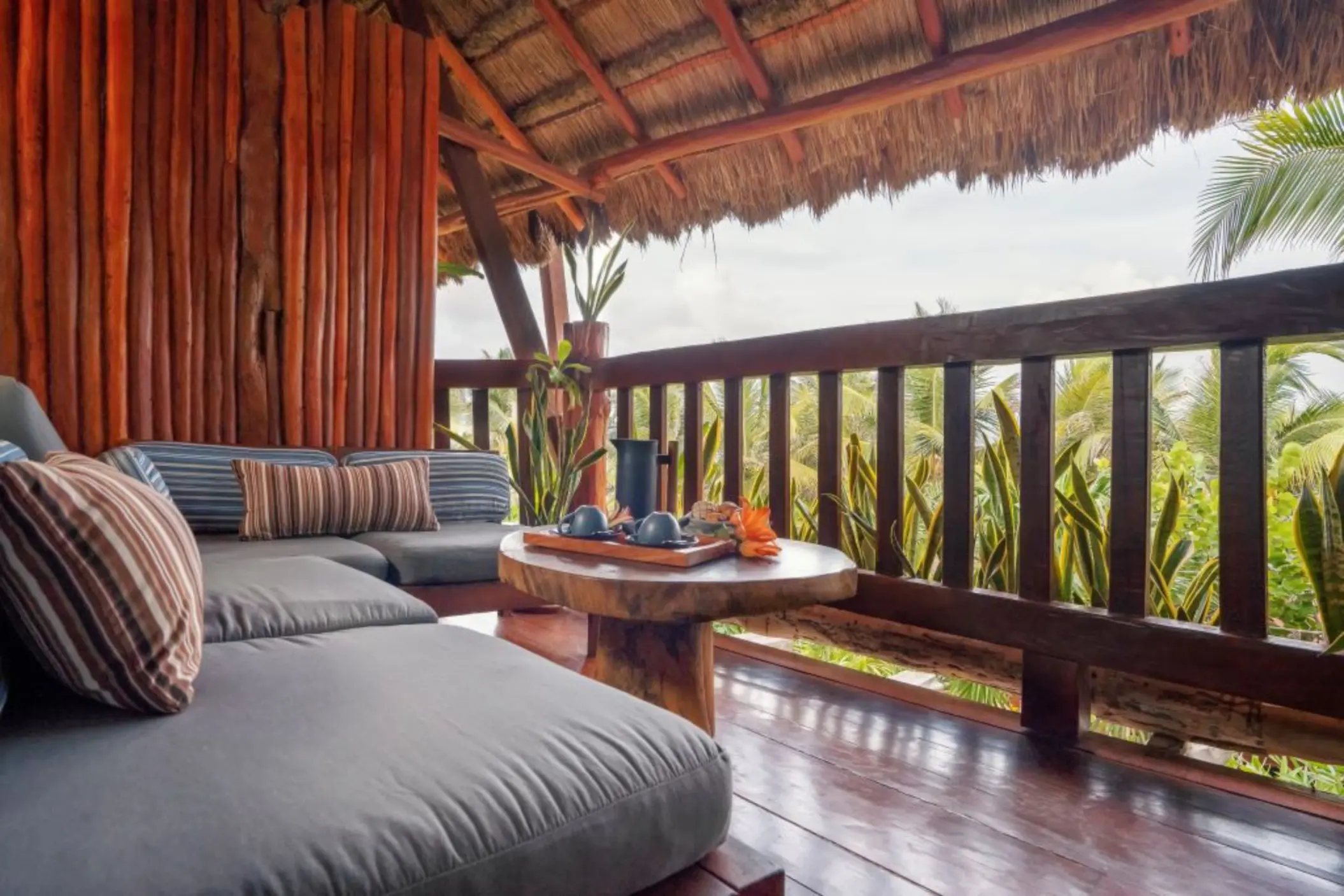 balcony of partial ocean view two double beds suite at Kanan Tulum Hotel & Spa
