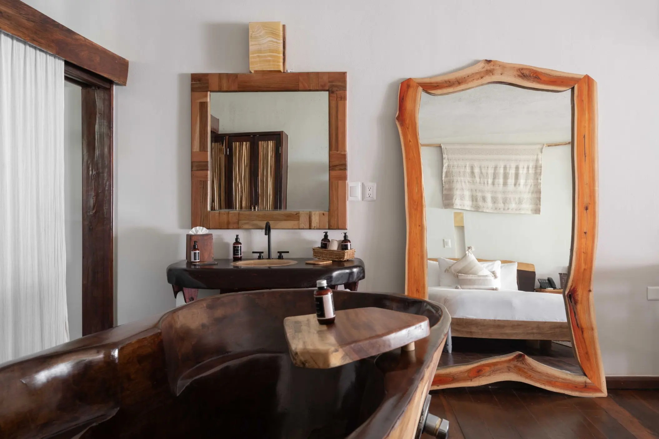 jungle suite king bed at Kanan Tulum Hotel & Spa