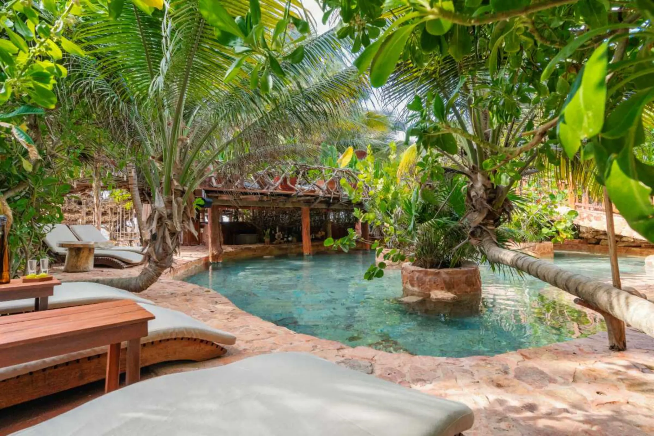 pool and loungers at Kanan Tulum Hotel & Spa