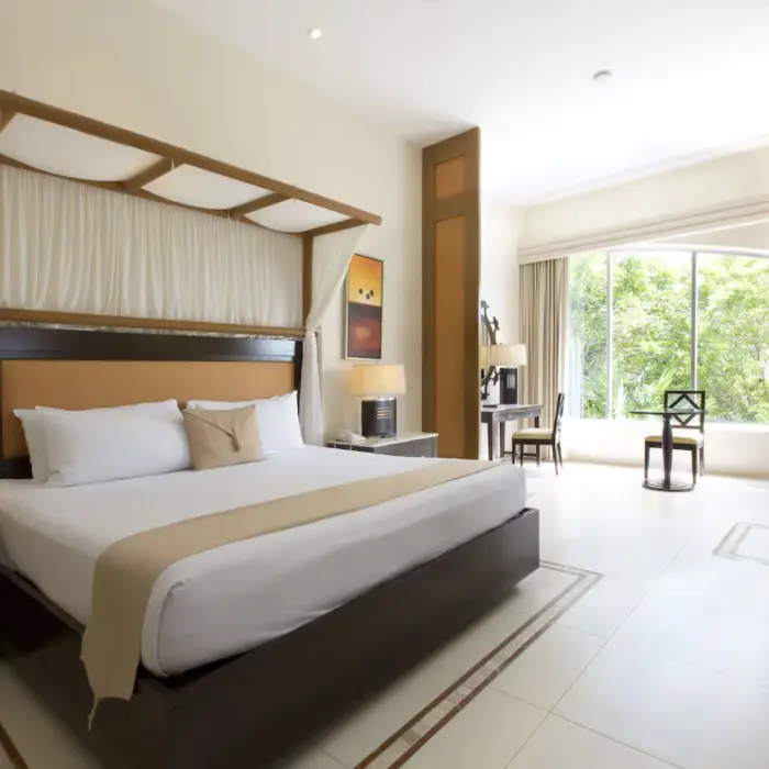 suite with king bed at Kore Tulum