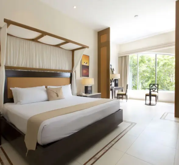 suite with king bed at Kore Tulum