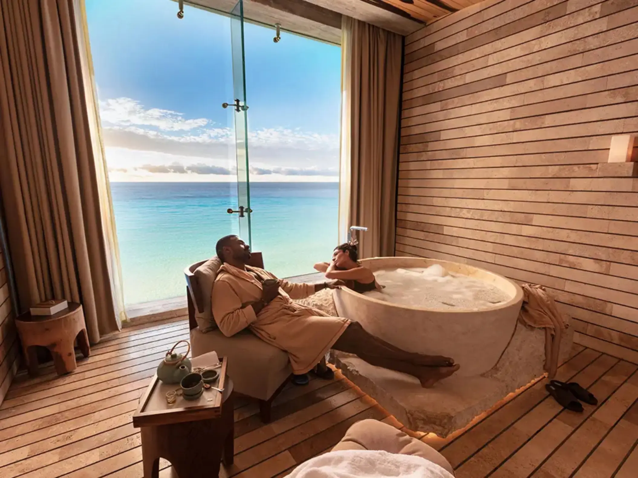 couple in the spa overlooking the ocean at La Casa de la Playa