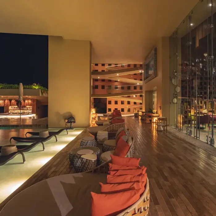 poolside restaurant at night at La Casa de la Playa
