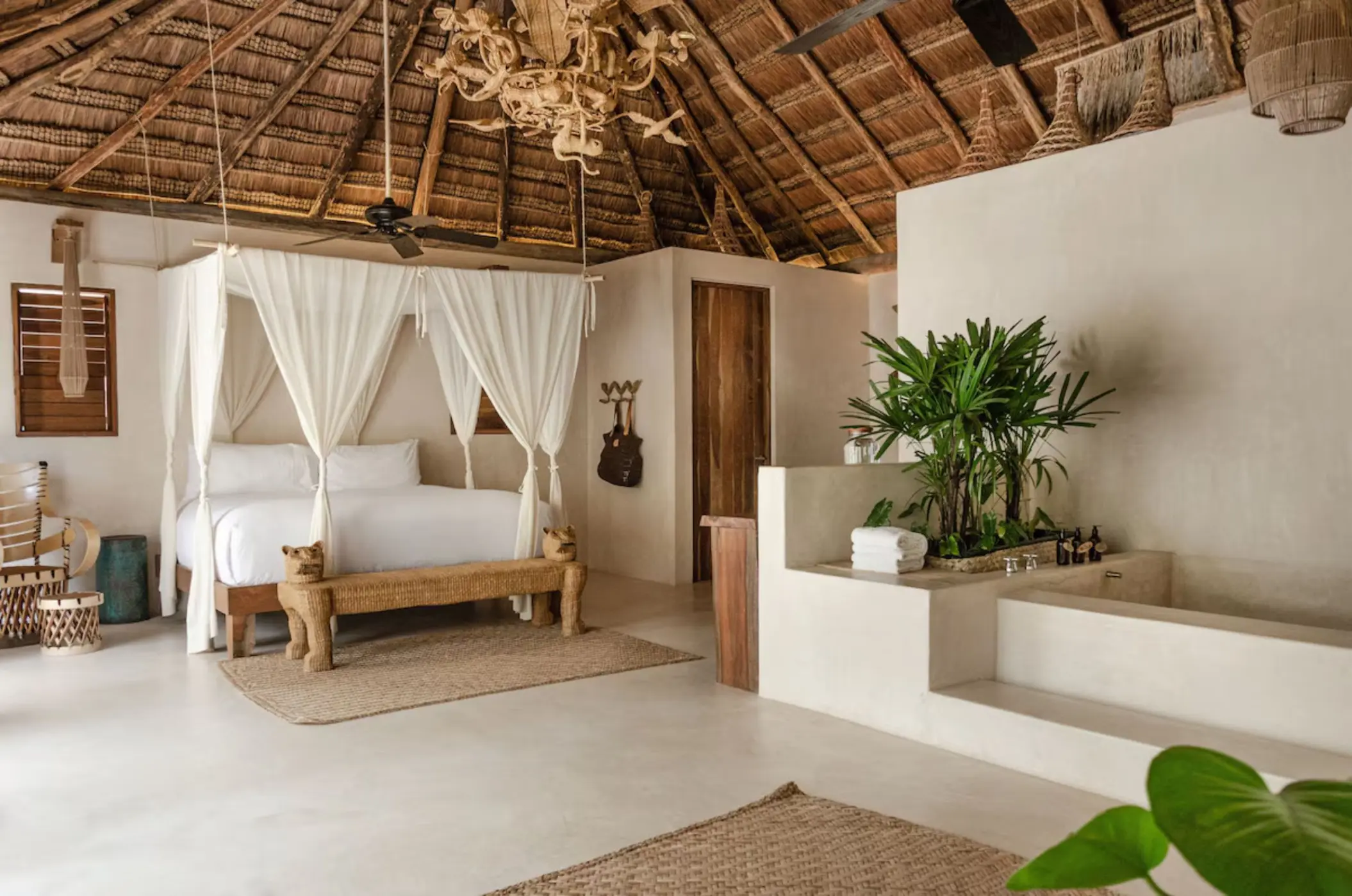 room at La Valise Tulum with poster bed and bathtub