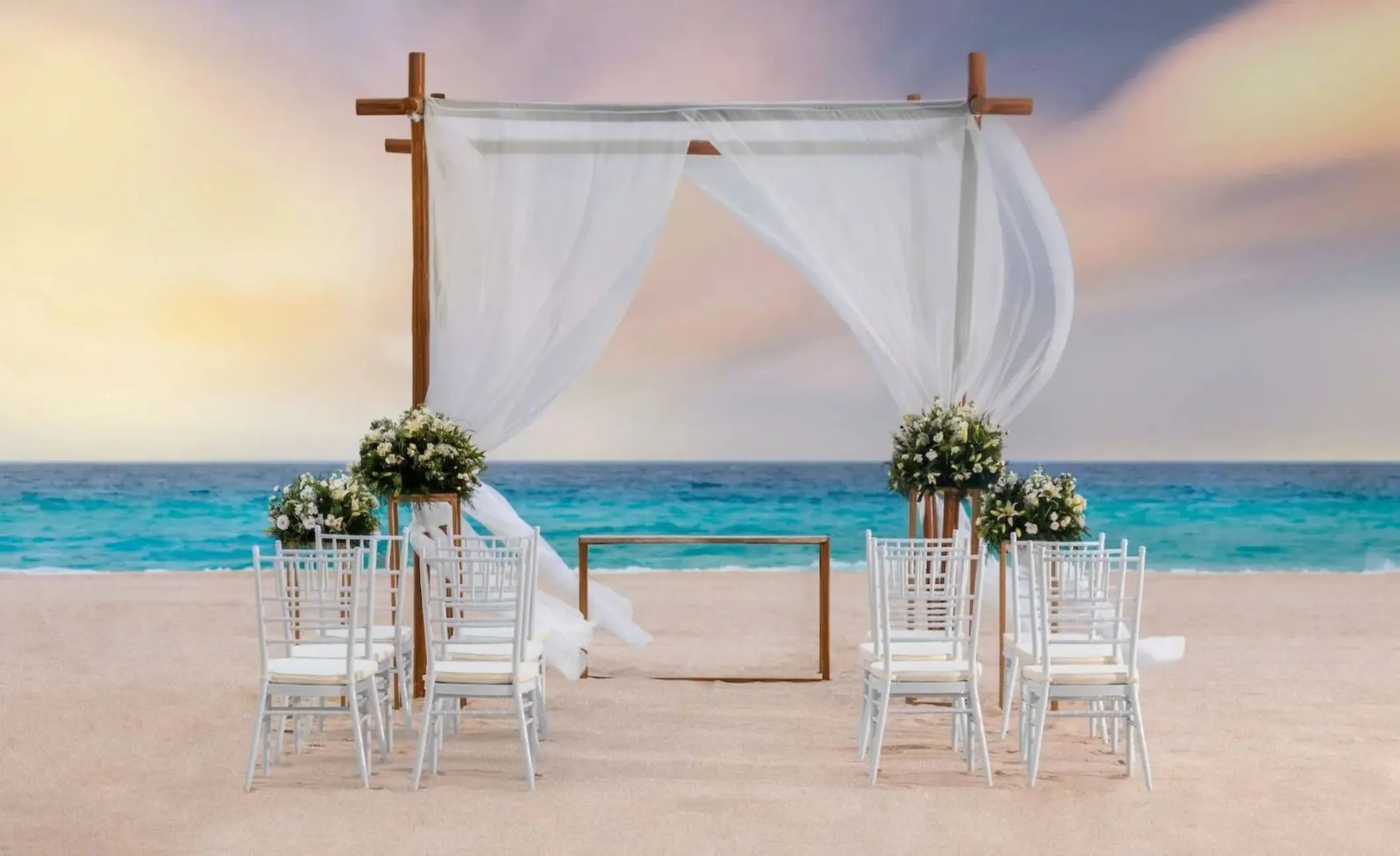 beach ceremony setup at Le Blanc Spa Resort Cancun