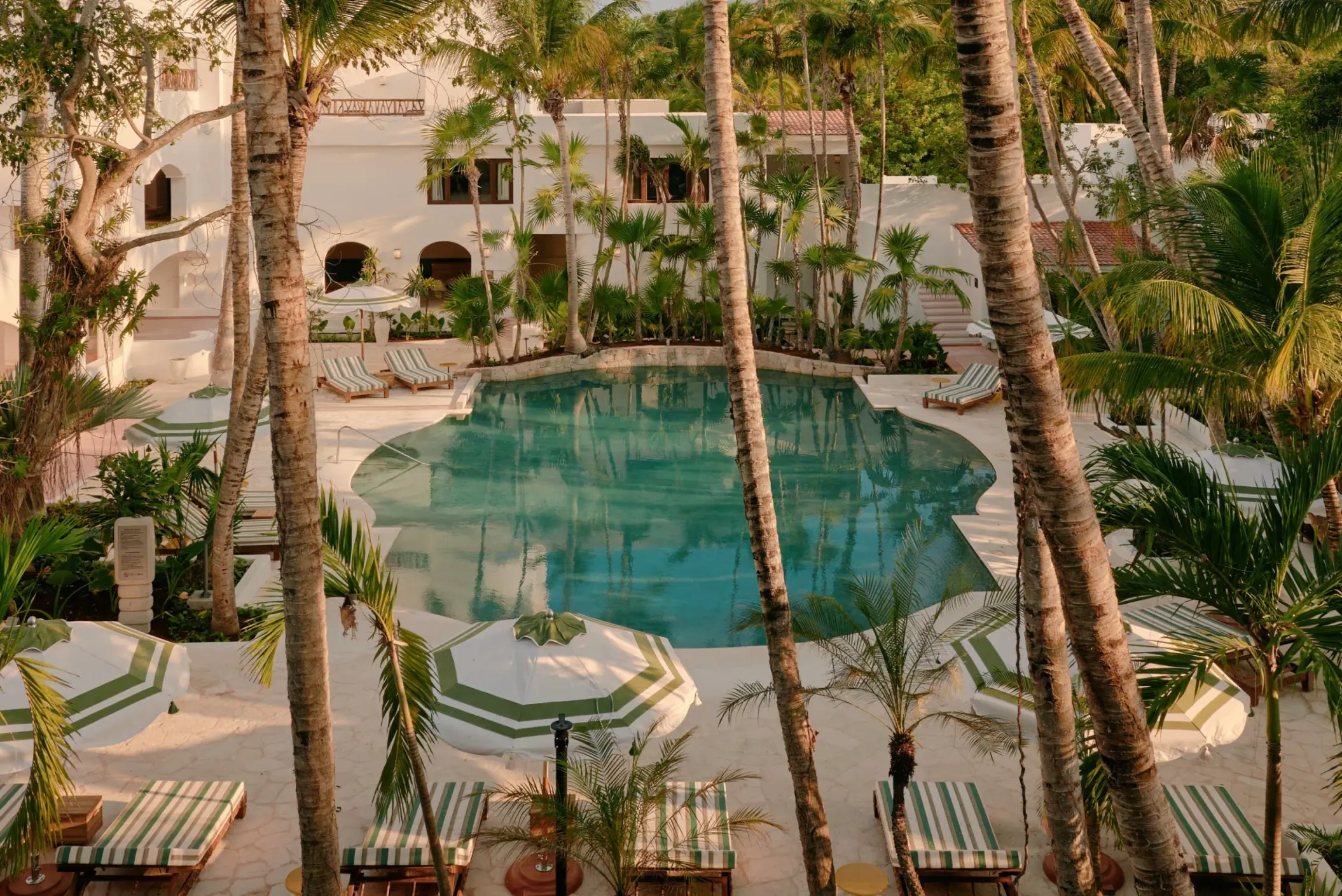 pool and resort buildings at Maroma a Belmond Hotel