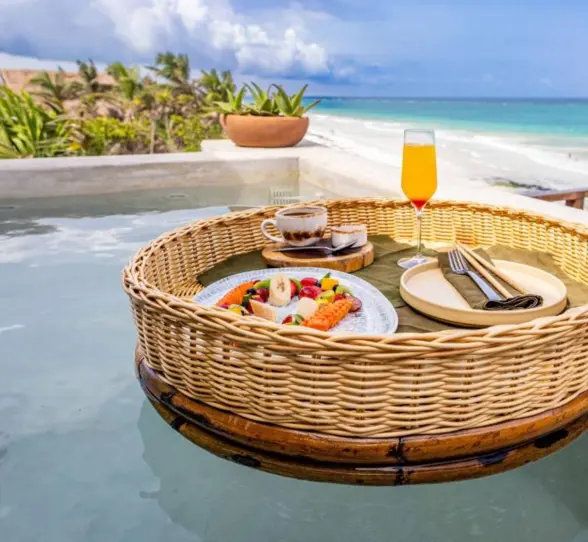 floating breakfast at the oceanfront pool at Mezzanine Hotel
