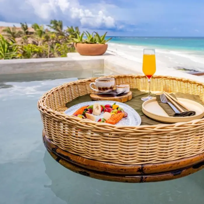 floating breakfast at the oceanfront pool at Mezzanine Hotel