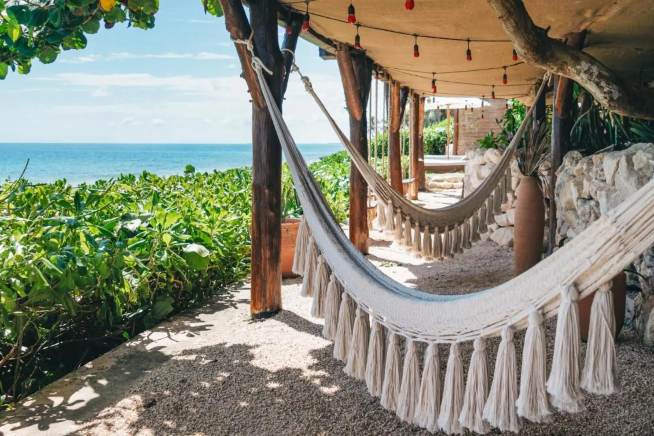 hammocks by the beach at Mezzanine Hotel