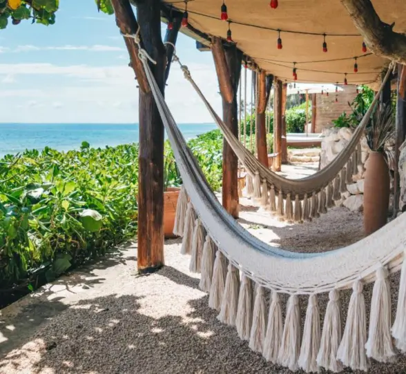 hammocks by the beach at Mezzanine Hotel