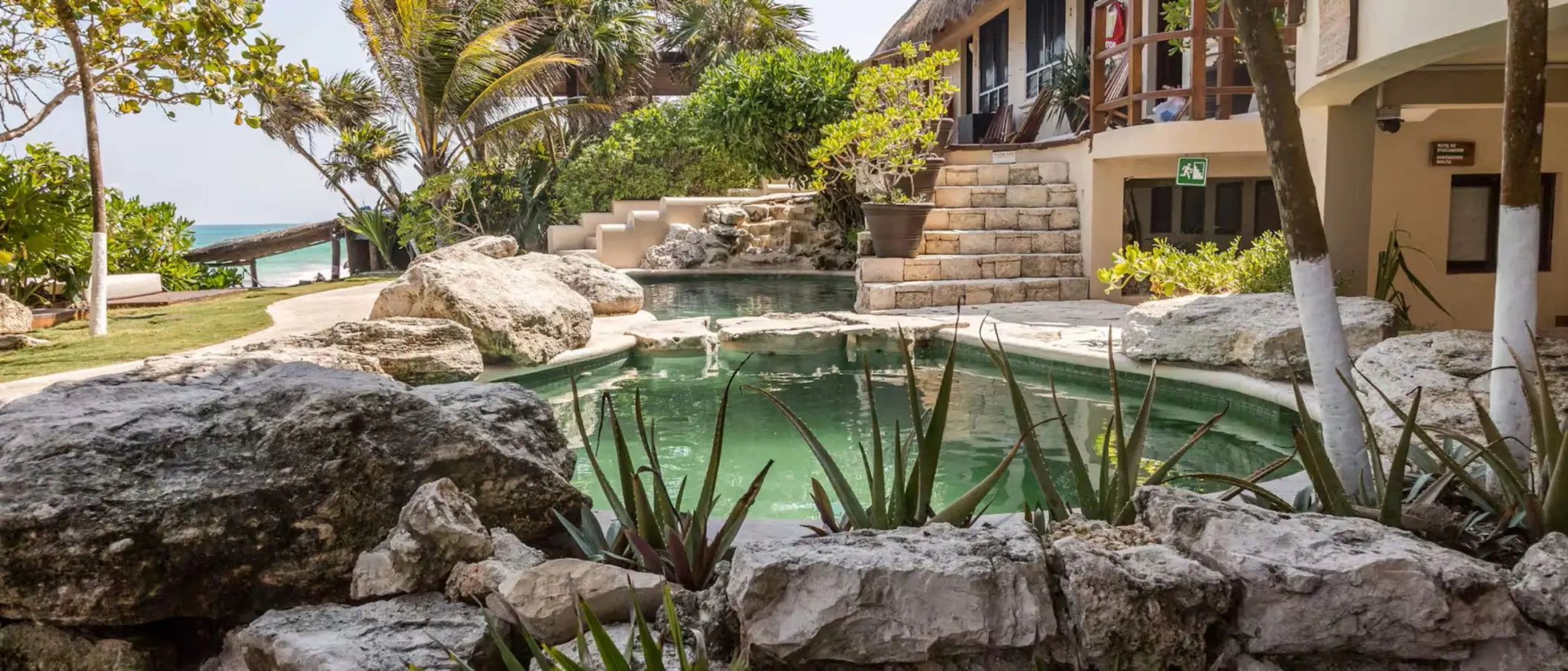 pool and gardens at Mezzanine Hotel
