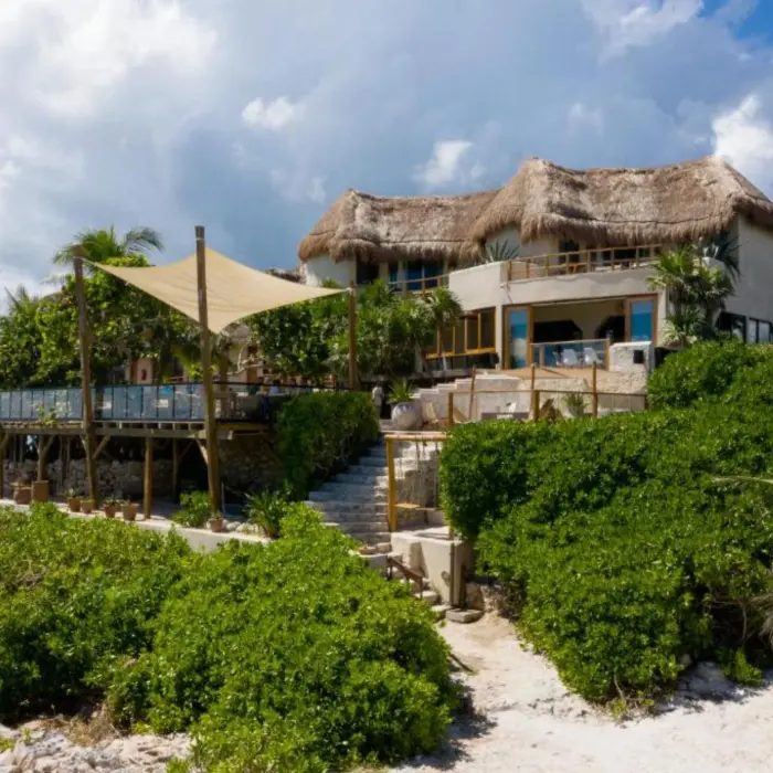 steps leading from the hotel to the beach at Mezzanine Hotel