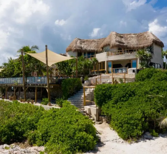 steps leading from the hotel to the beach at Mezzanine Hotel