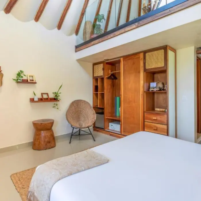 suite with wooden accents at Mezzanine Hotel