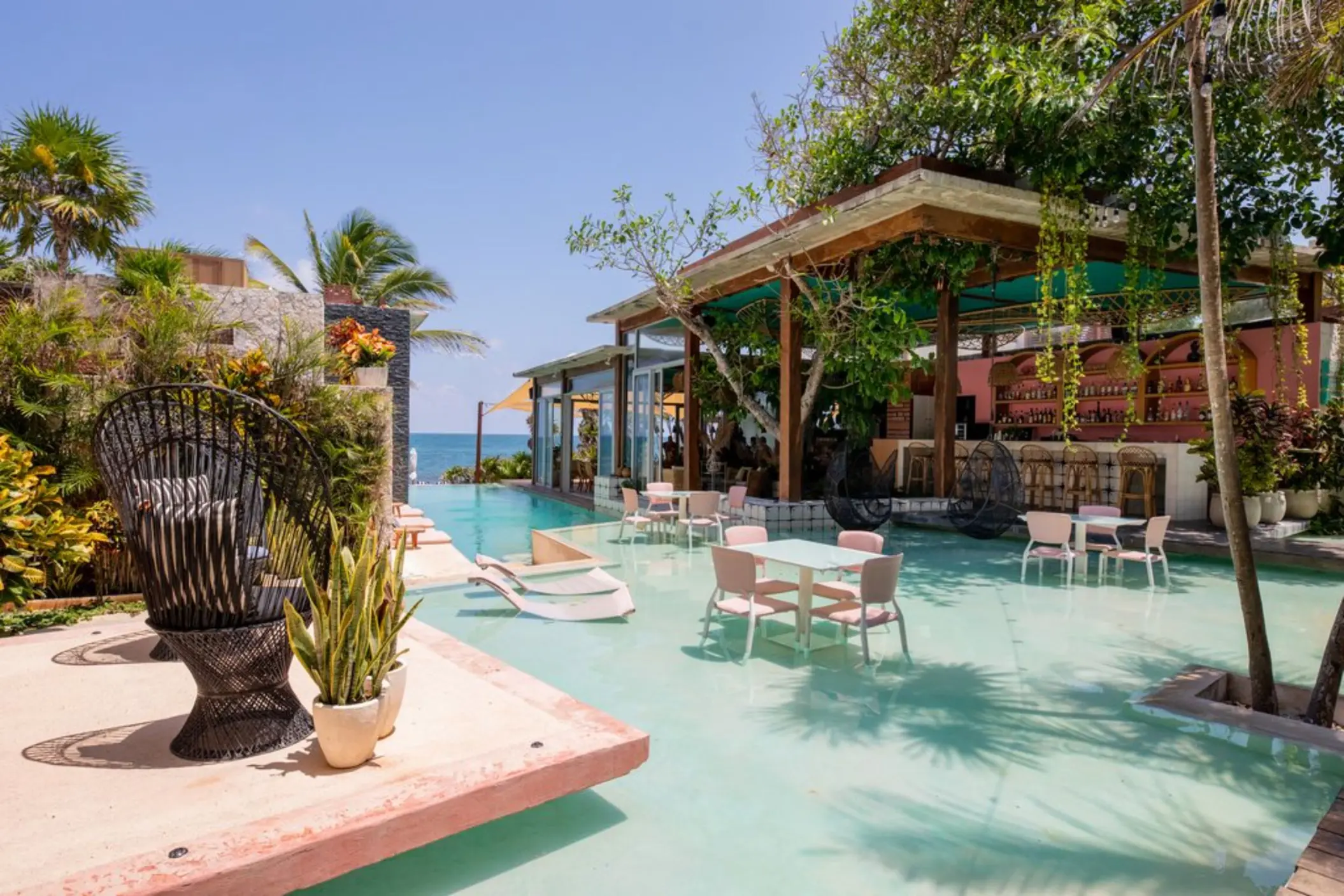 pool and bar overlooking the sea at Mi Amor