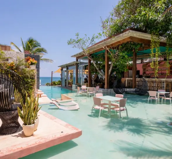 pool and bar overlooking the sea at Mi Amor
