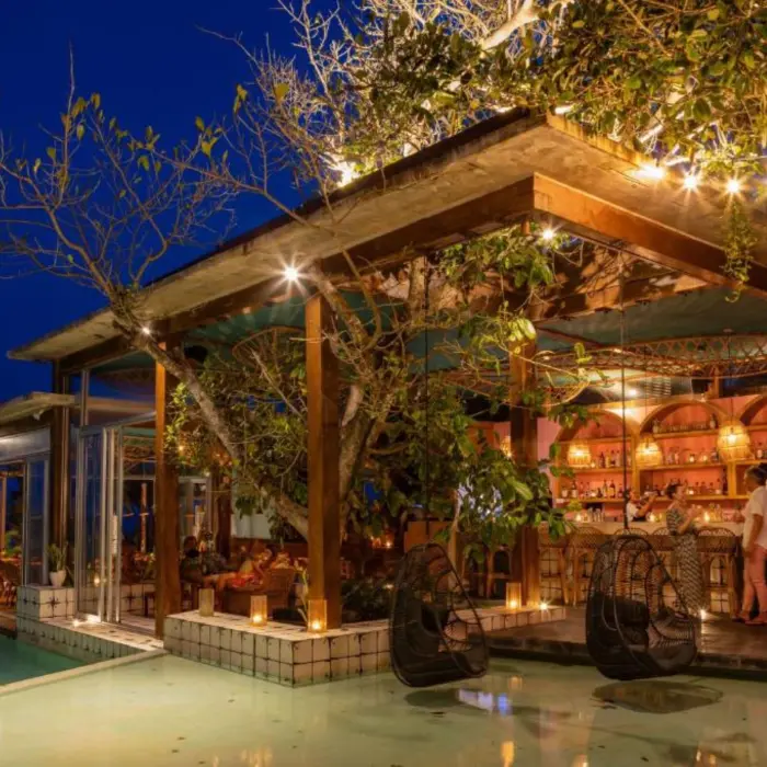 poolside bar at night at Mi Amor