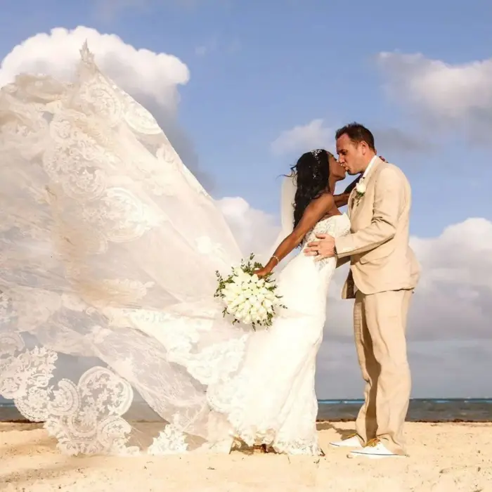 bride and groom on the beach at Moon Palace Cancun