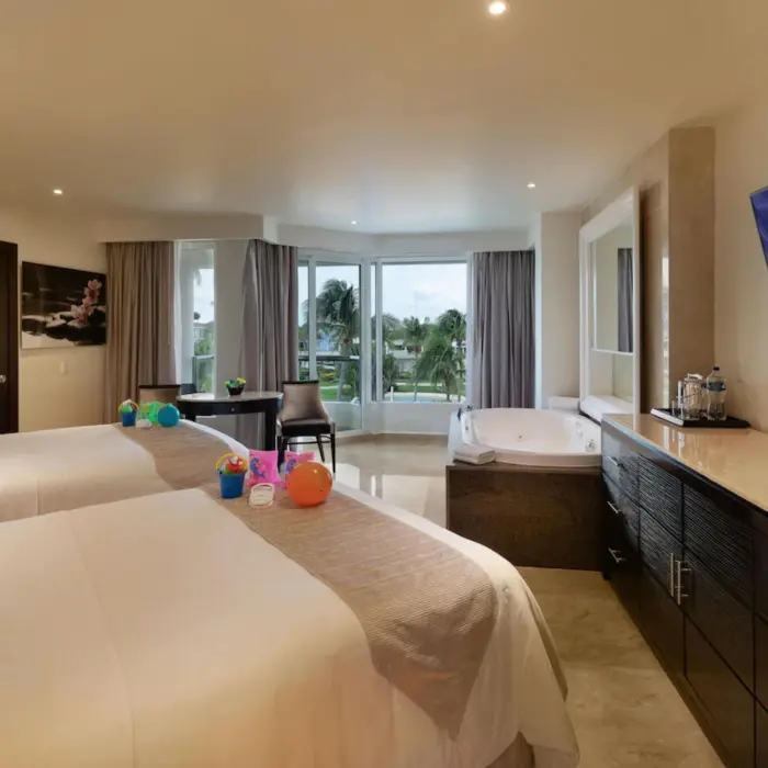 superior family suite garden view with two beds at Moon Palace Cancun