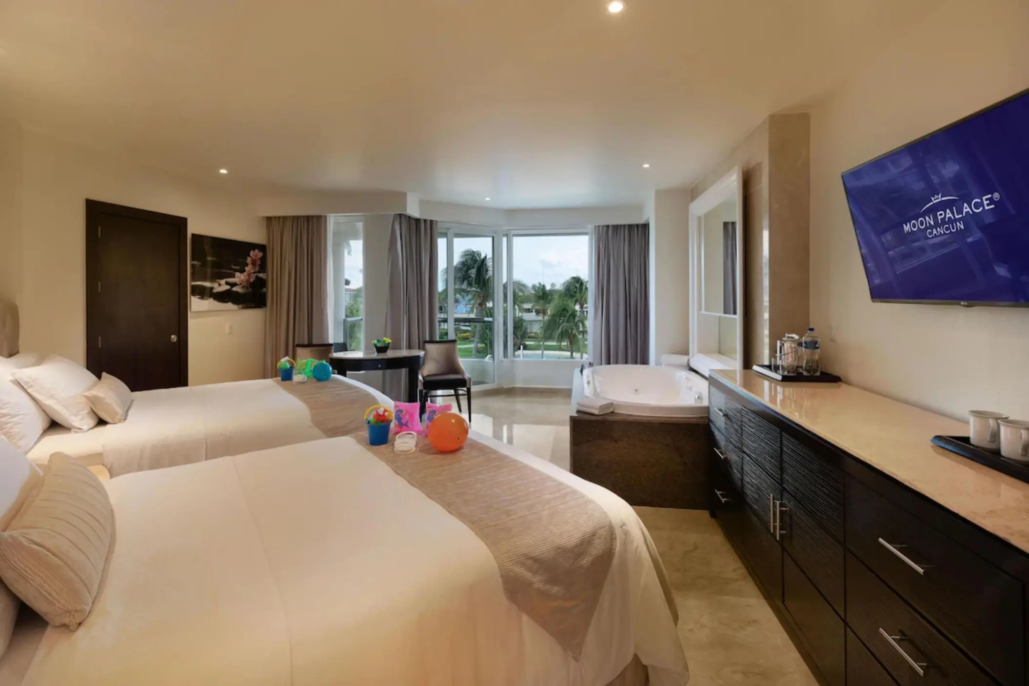 superior family suite garden view with two beds at Moon Palace Cancun