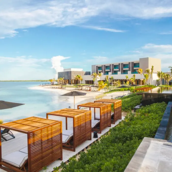 pool, cabanas, and the beach at Nizuc Resort and Spa