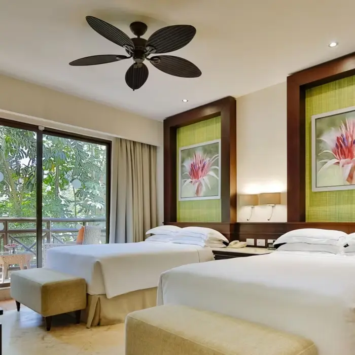 room with two beds at occidental at xcaret destination