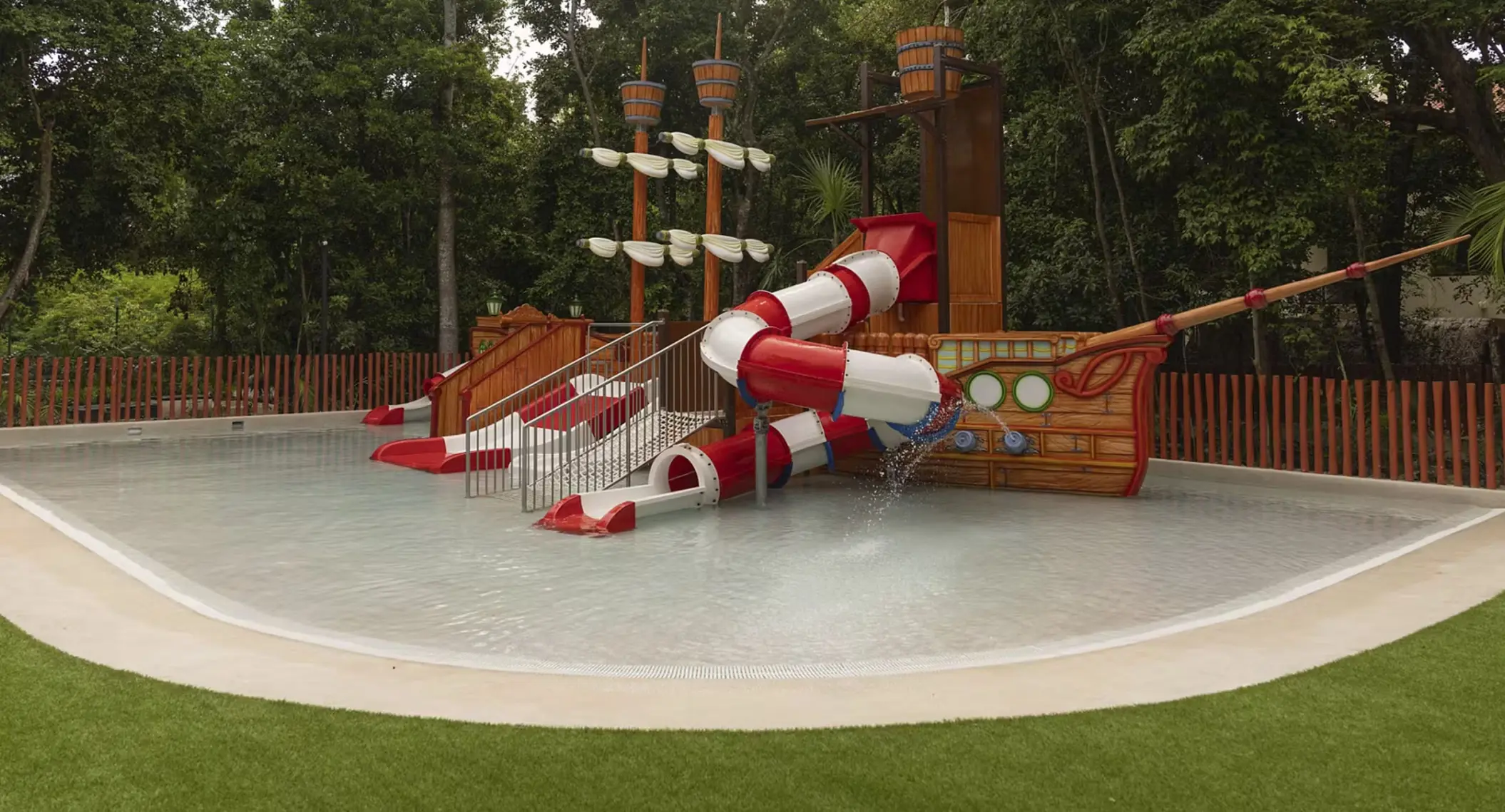 splash pool with slides for kids at occidental at xcaret destination