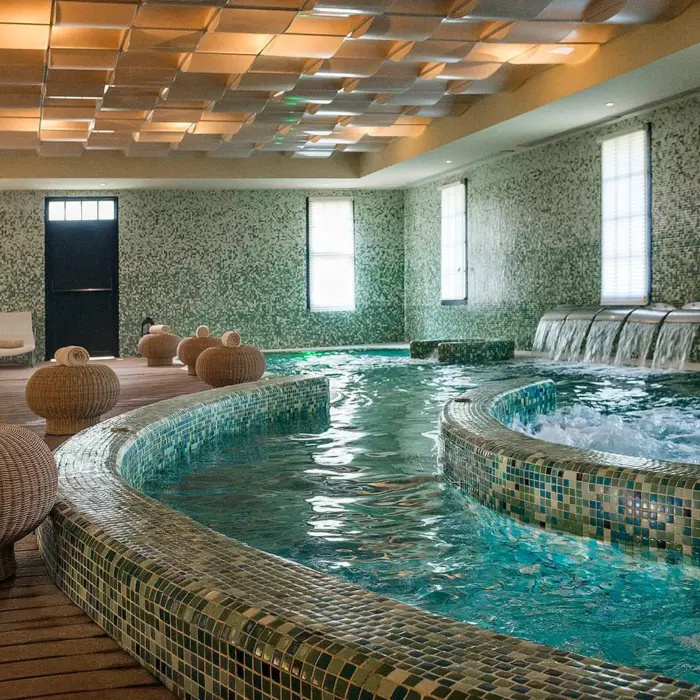 The spa's hydrotherapy circuit with a jacuzzi and a flowing water feature.