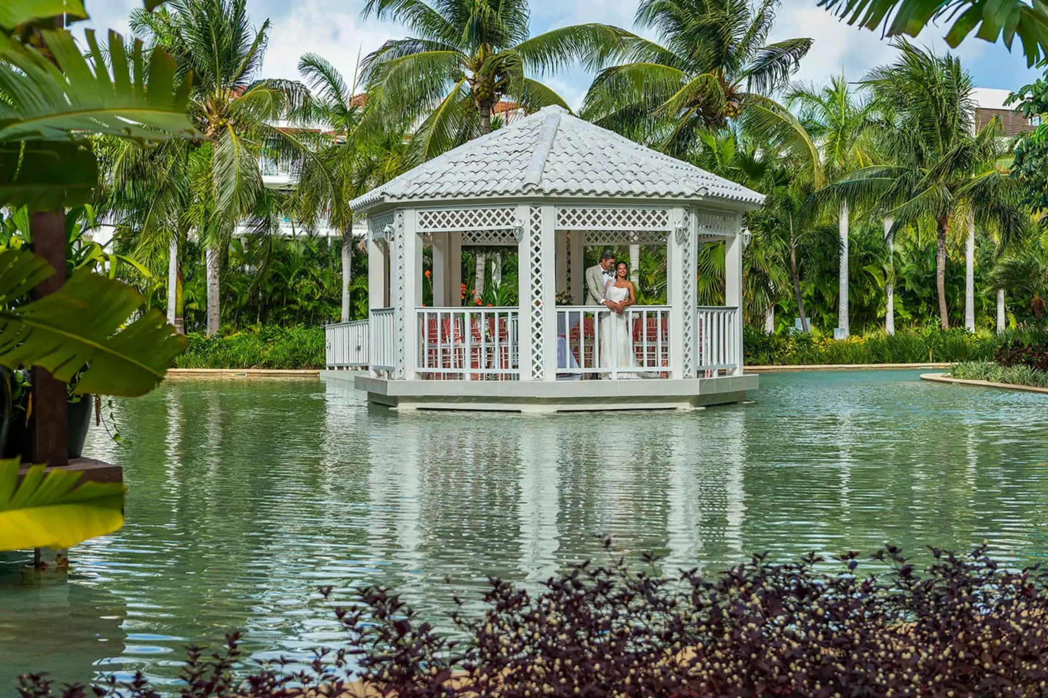 bride and groom at the gazebo at Ocean Riviera Paradise