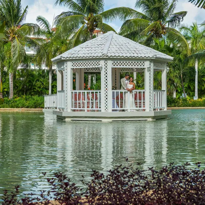 bride and groom at the gazebo at Ocean Riviera Paradise