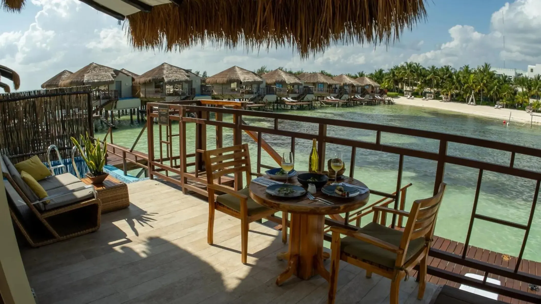 balcony of a bungalow at Palafitos Overwater Bungalows
