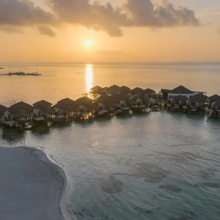 Palafitos Overwater Bungalows at dawn