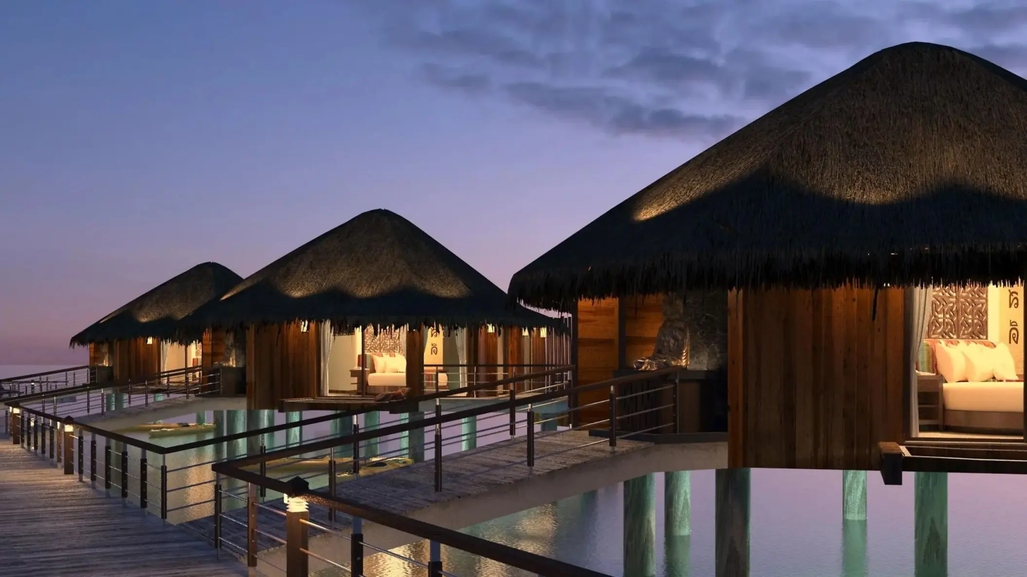 Palafitos Overwater Bungalows at night