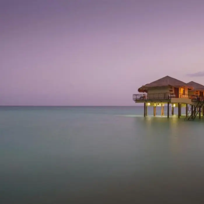 Palafitos Overwater Bungalows during dusk