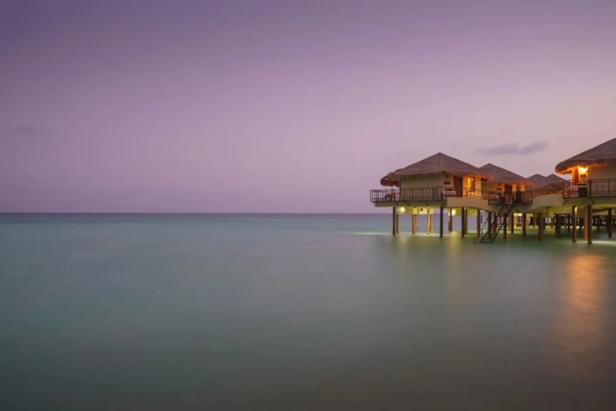 Palafitos Overwater Bungalows during dusk