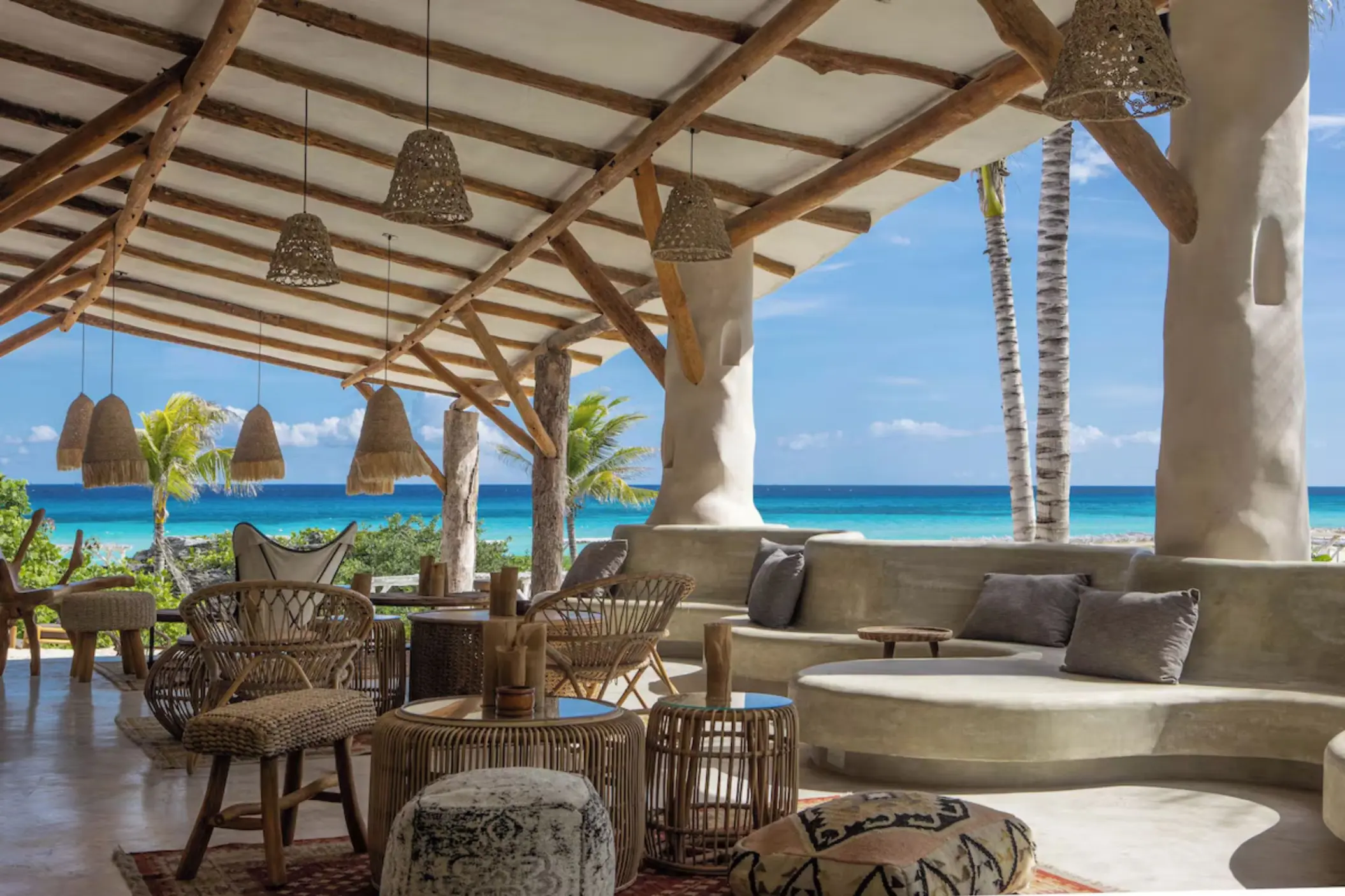 beach bar with chic seating at Palmaia House of AiA resort