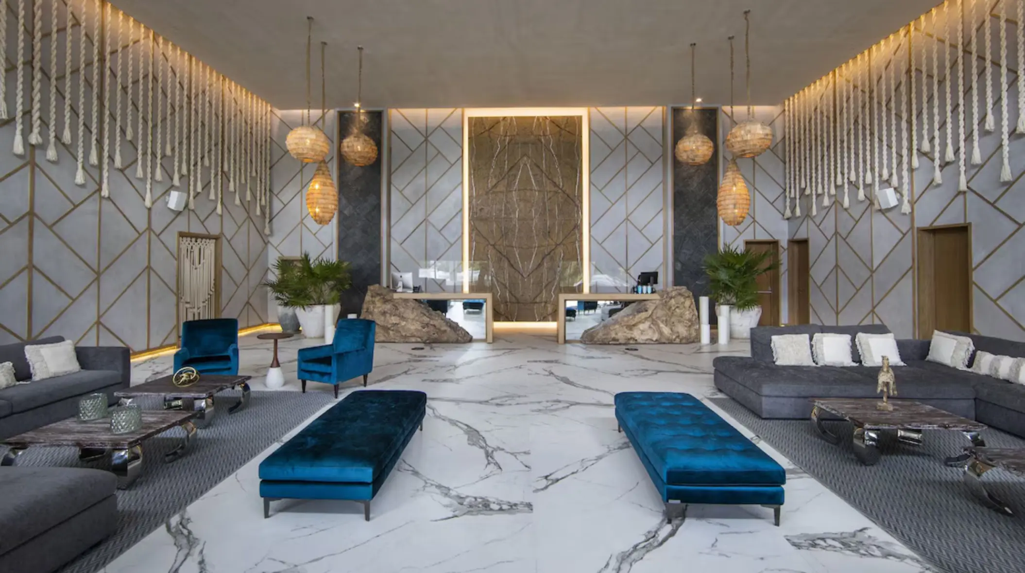 massive lobby with rustic decor at Palmaïa – The House of AïA
