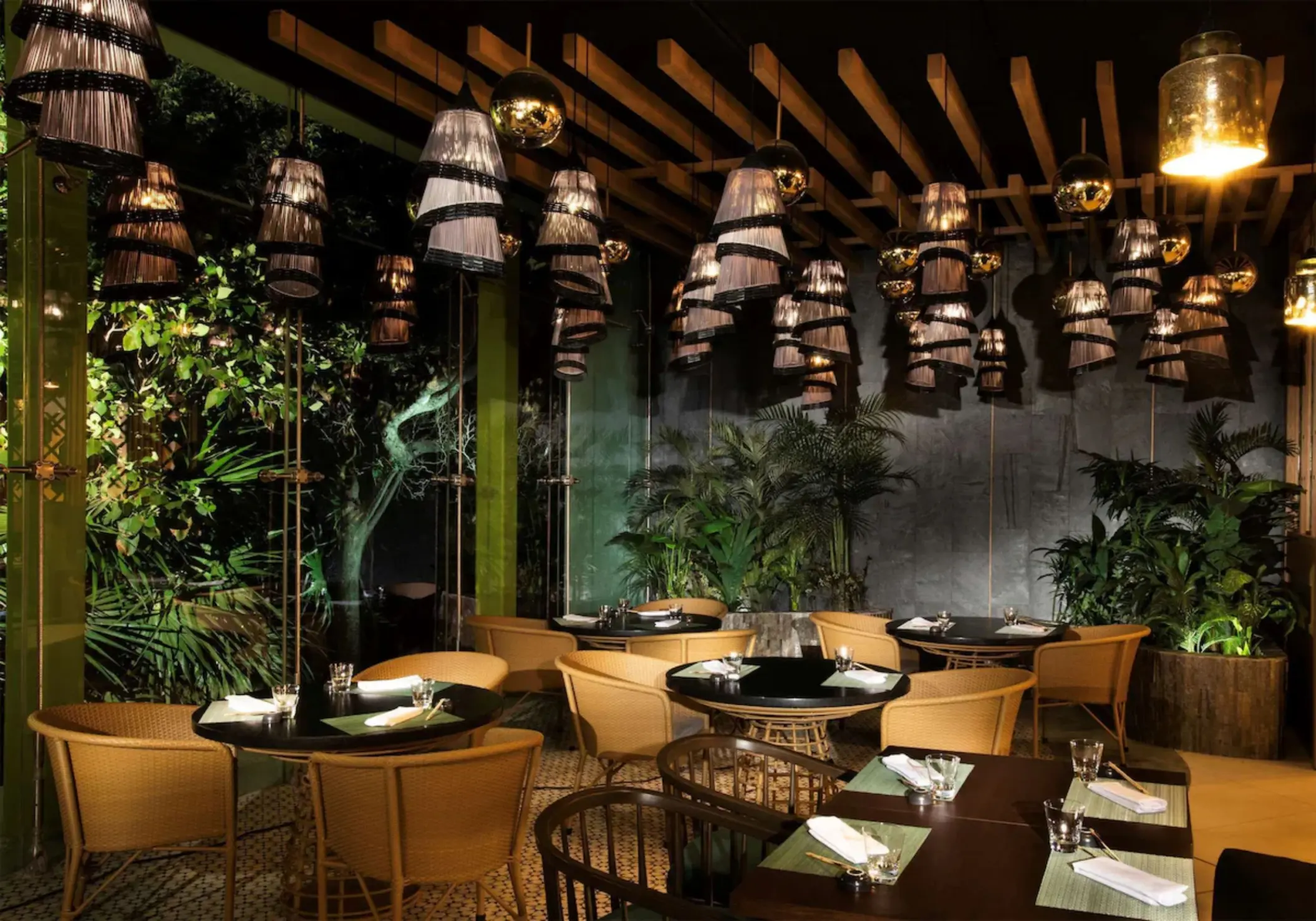 Artistic restaurant with ambient lighting at Palmaïa – The House of AïA