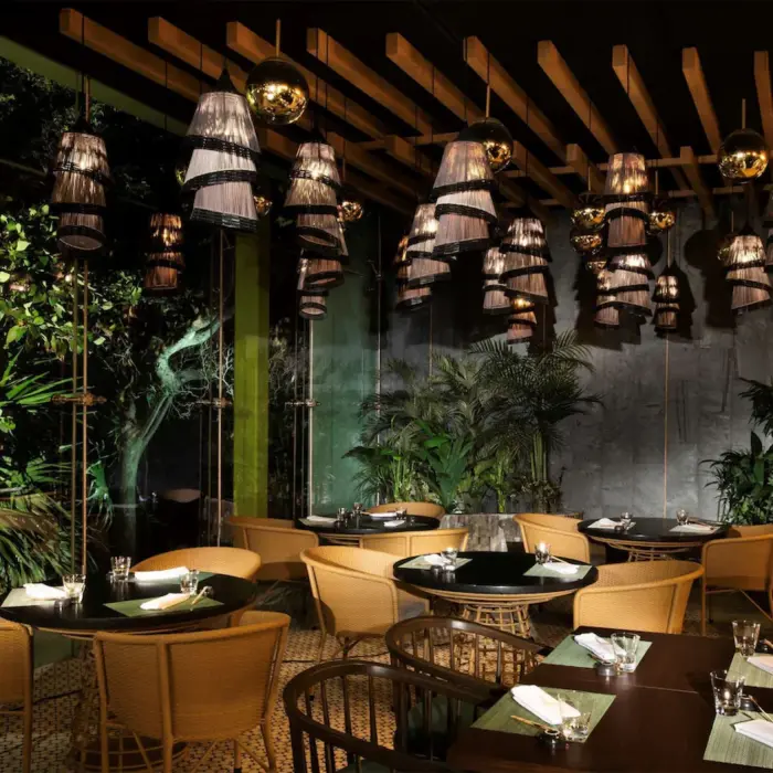 Artistic restaurant with ambient lighting at Palmaïa – The House of AïA