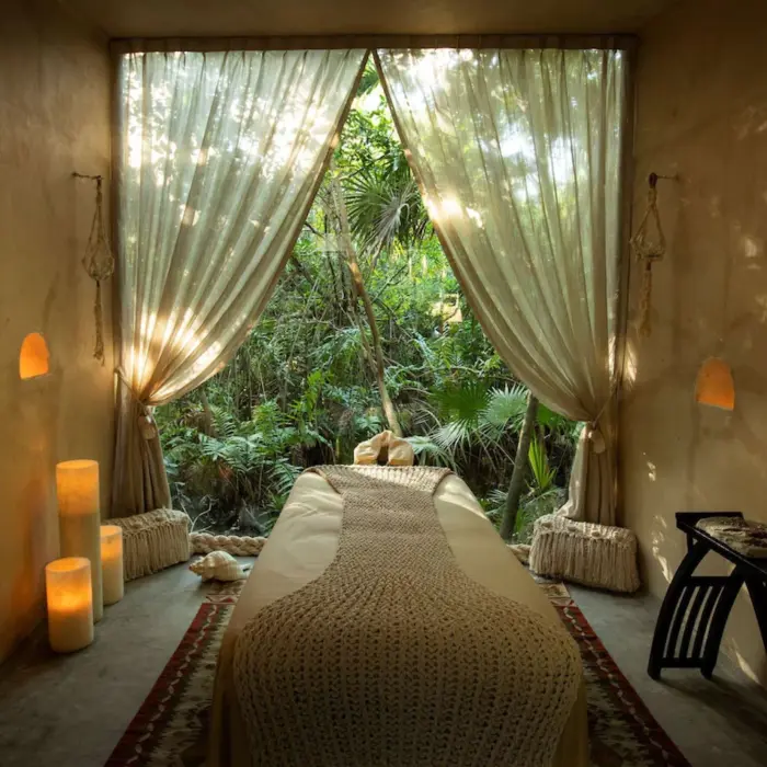 rustic massage room at the spa at Palmaïa – The House of AïA resort