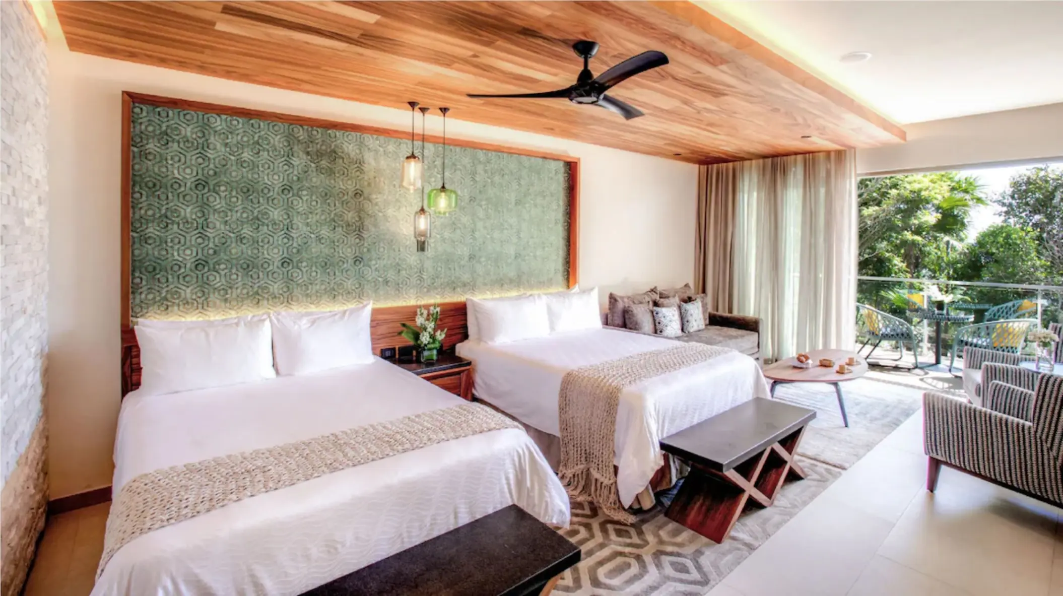 spacious suite with 2 queen size beds at Palmaïa – The House of AïA resort