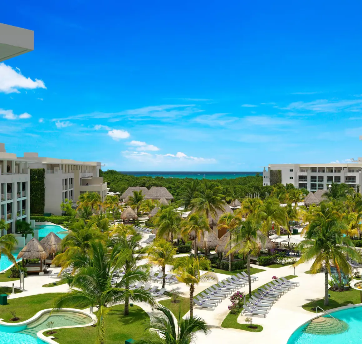 Paradisus Playa del Carmen resort buildings and pool and sea views