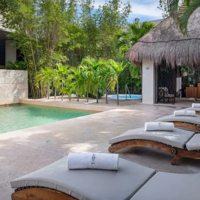 yhi spa pool with loungers at Paradisus Playa del Carmen