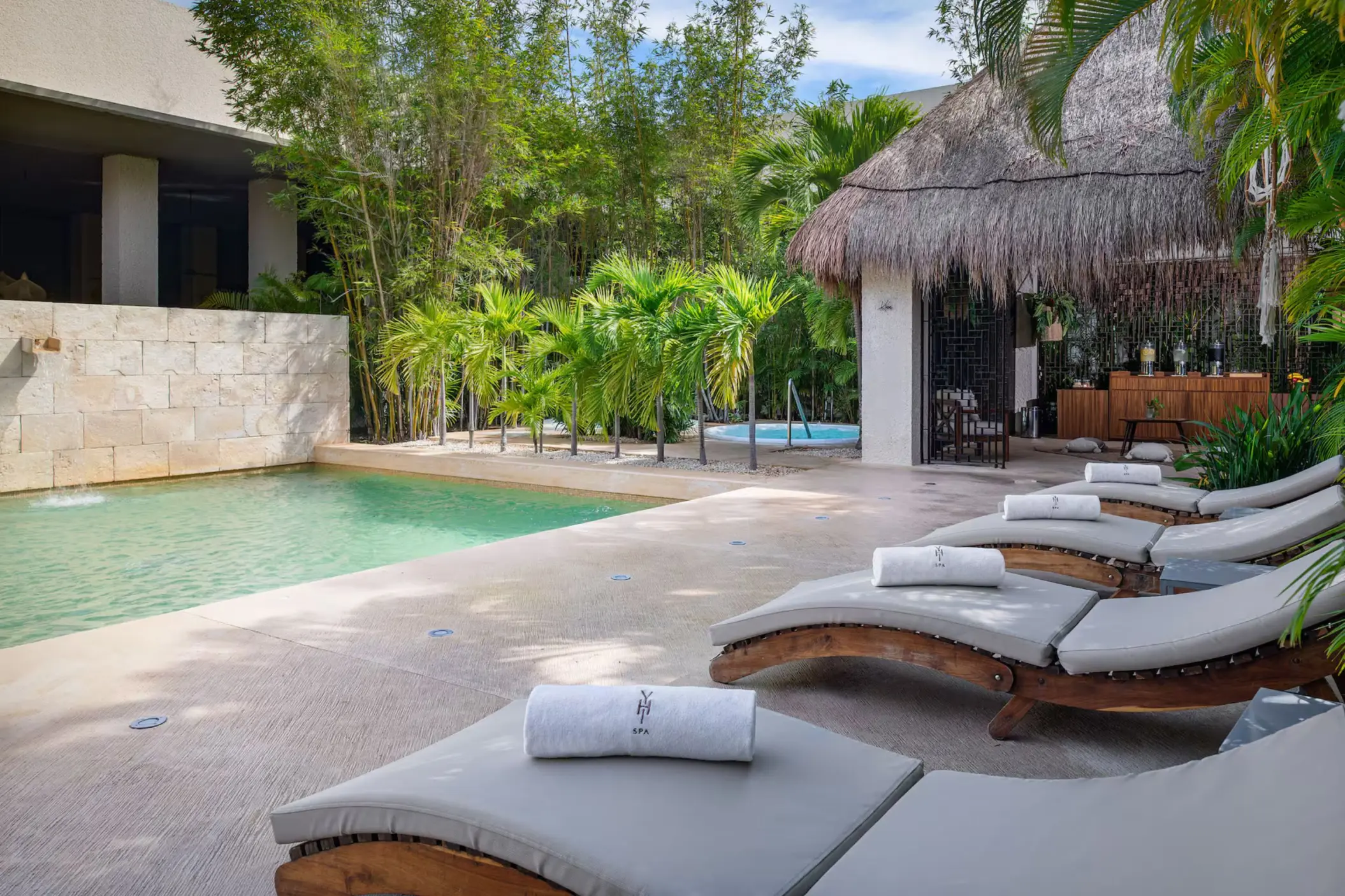 yhi spa pool with loungers at Paradisus Playa del Carmen